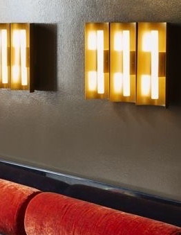 Warm wall lighting creating ambience in a hospitality venue