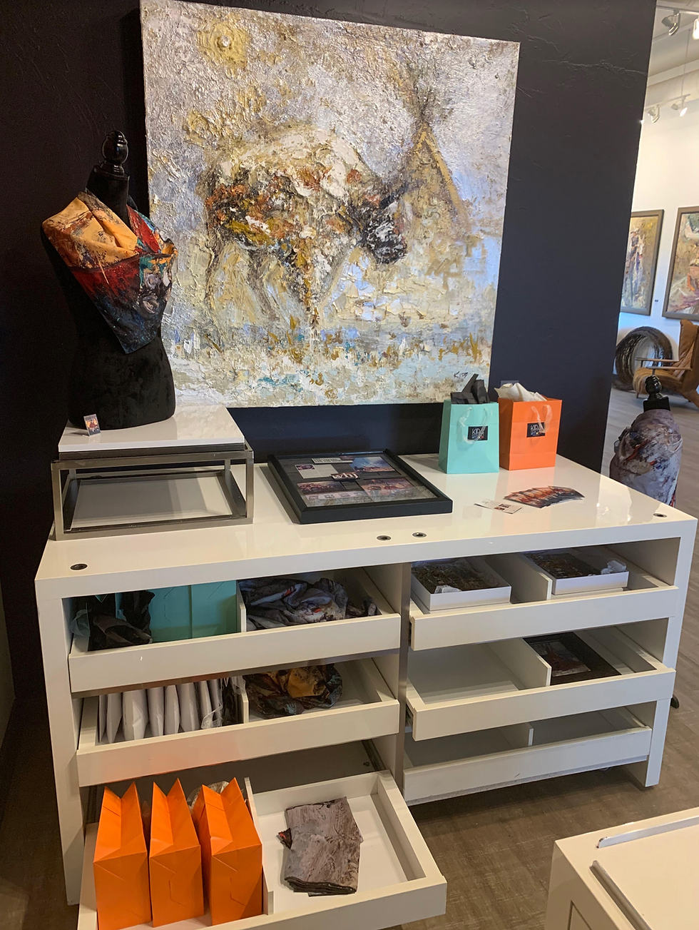 we're awaiting your visit. Come to Big Sky, our gallery is packed full of color!