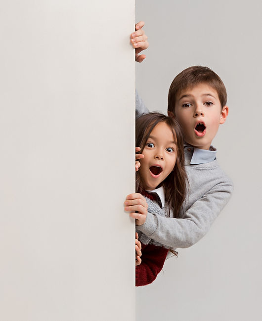banner-with-surprised-children-peeking-at-the-edge.jpg