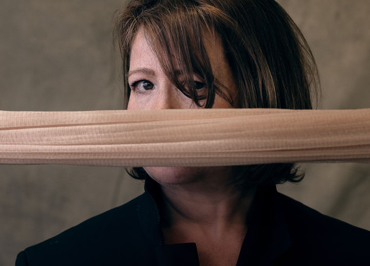 Professional portrait of a woman during a studio photography session