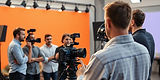 group of people directing a video shoot for a business.jpg
