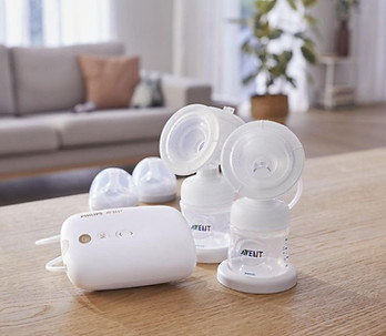 Phlips avent SCF398-11 dubbele elektrische borstkolf oplaadbaar op tafel in woonkamer.jpg