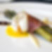 Asparagus wrapped in Parma ham with poached egg