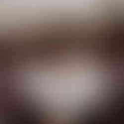 siblings stand together in frosted fall field