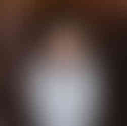 little boy stands in frosted fall field during westfield family photos