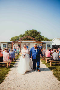 Blossom Barn bride and groom walk down the aisle after their wedding ceremony