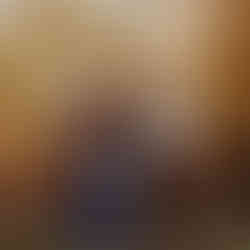 grandma stands with her granddaughter's family and great grand kids during fall family photos