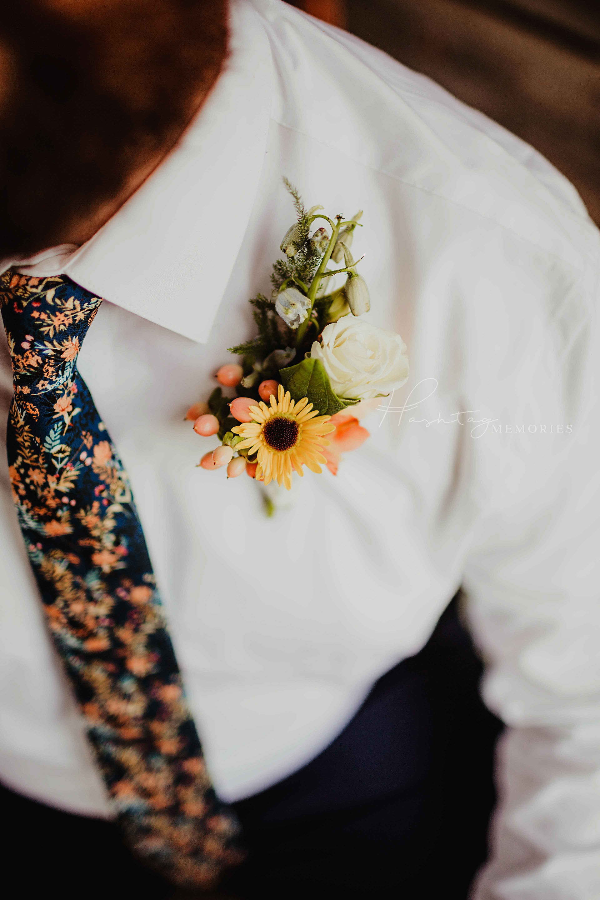 yellow, pink and white groom boutonniere for jean casual wedding 