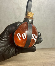 black bottle holder gloved hand holding potionz hp bottle.jpg