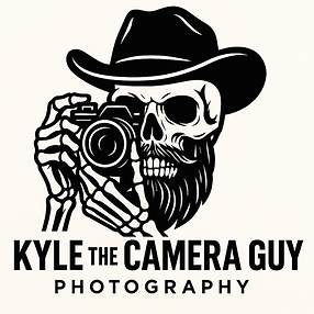 Logo of a skeleton in a cowboy hat holding a camera
