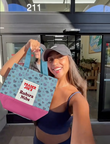 person holding tote bag.png