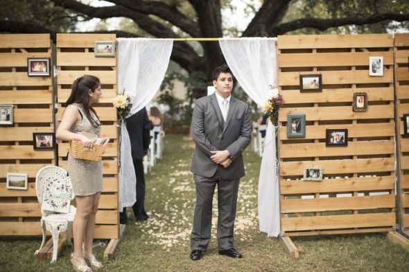 photo wall entrance to wedding ceremony | InkedWeddings.com