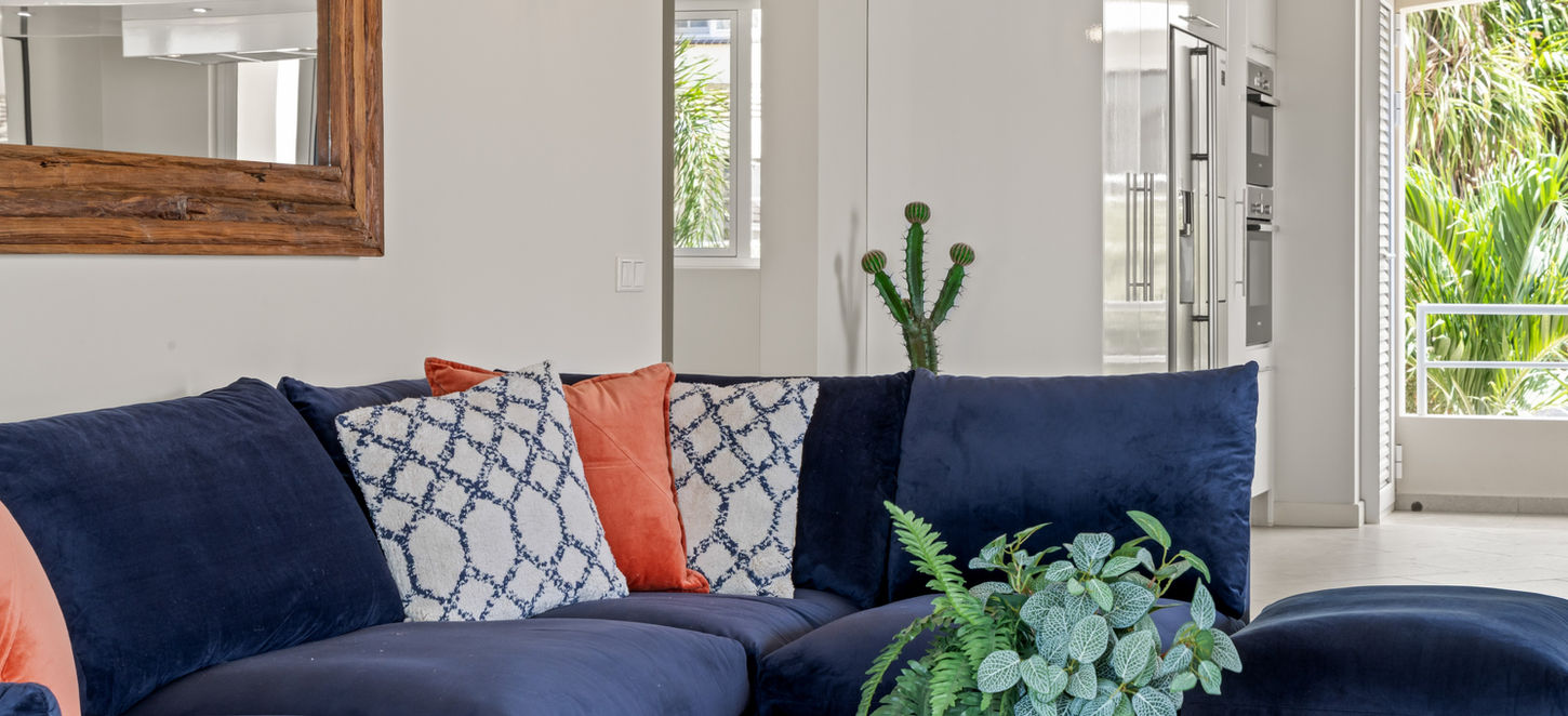 Cozy lounge space blending indoor comfort with outdoor living.