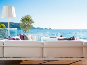 Quiet Luxury, Outdoor Coach on balcony overlooking the ocean