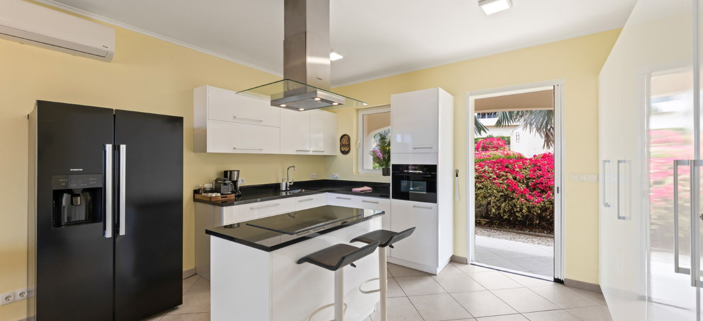 Modern kitchen with stainless steel appliances Curaçao vacation rental
