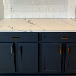 Deep Blue Kitchen Cabinets with Gold Hardware