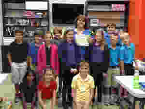Mrs. Tabitha Dillehay with her fifth grade students.