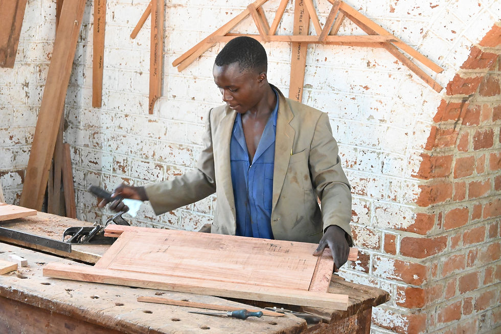 Joseph (carpentry trainee) shows off his new skills!