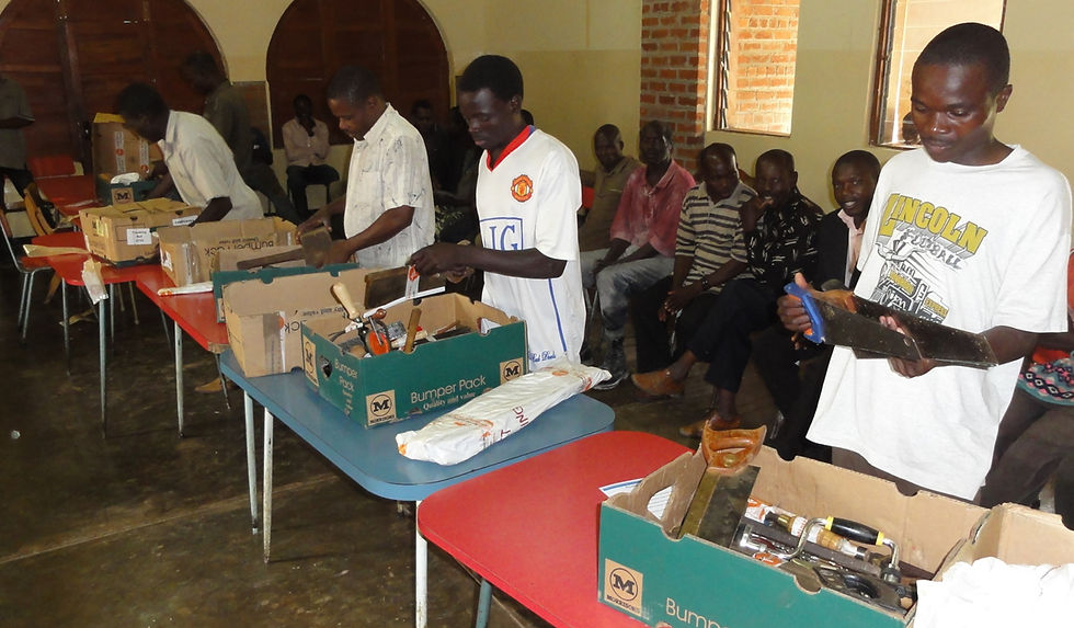 Trainees at Nyangombe CTC receiving TWAM tools on completion of their course.