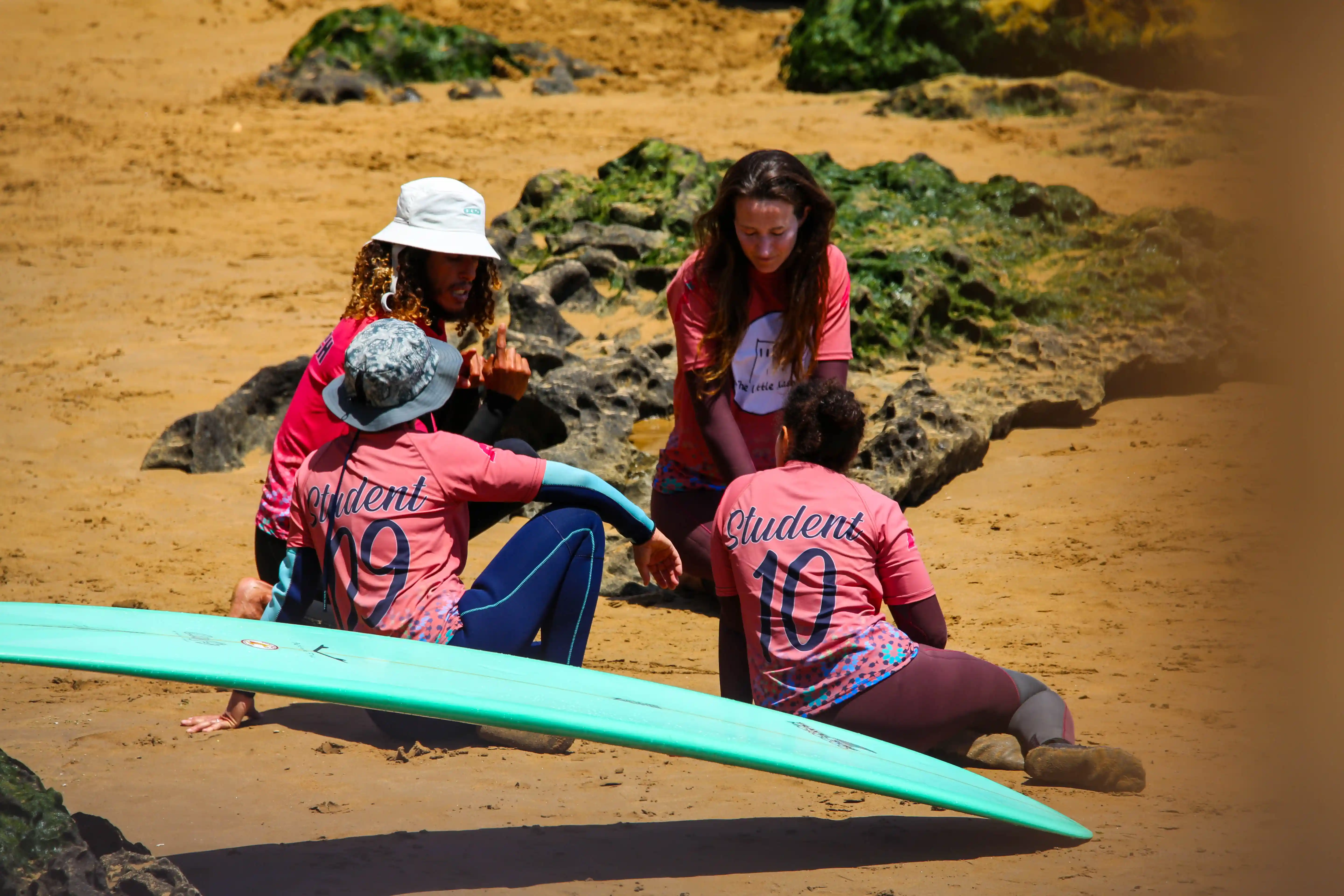 The Little Kasbah surf camp instructor giving a lesson on the beach in Imsouane