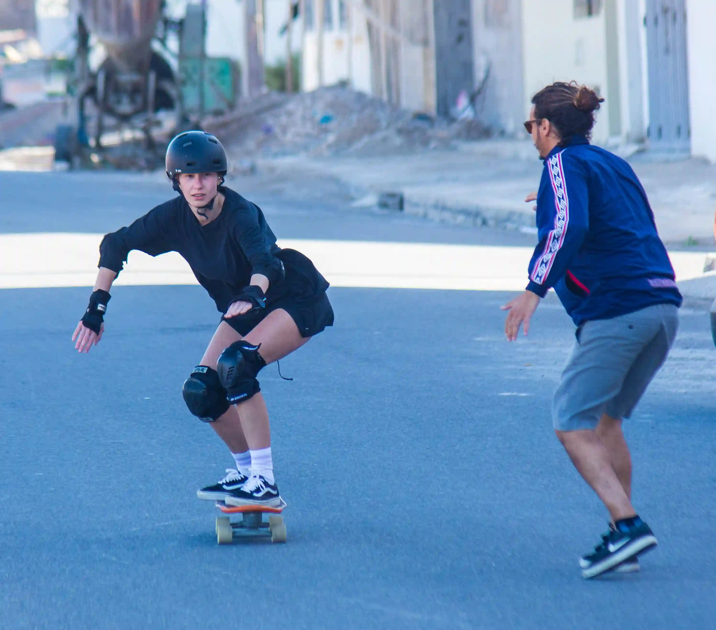 surfskate lesson with a girl on a skateboard 