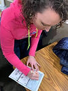 check being written.jpeg