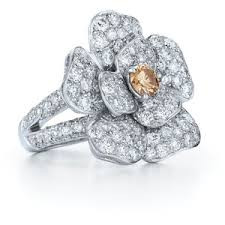 Platinum flower ring with yellow & white diamonds