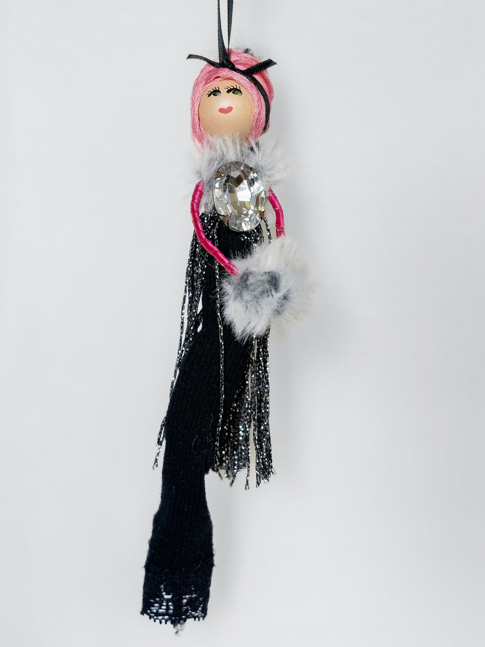 pink hair doll in black fancy dress