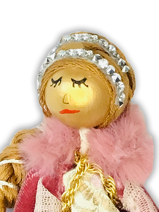 lady macbeth gold doll with crown and pink fur