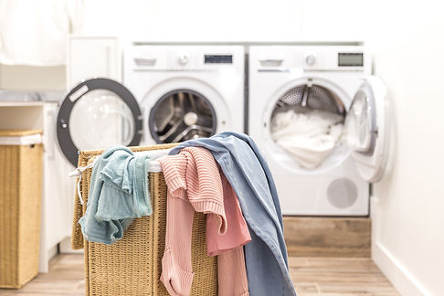 laundry-basket-with-dirty-clothes-with-washing-drying-machines-background (1).jpg