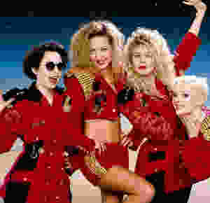 The pop punk band Fuzzbox in red uniforms.