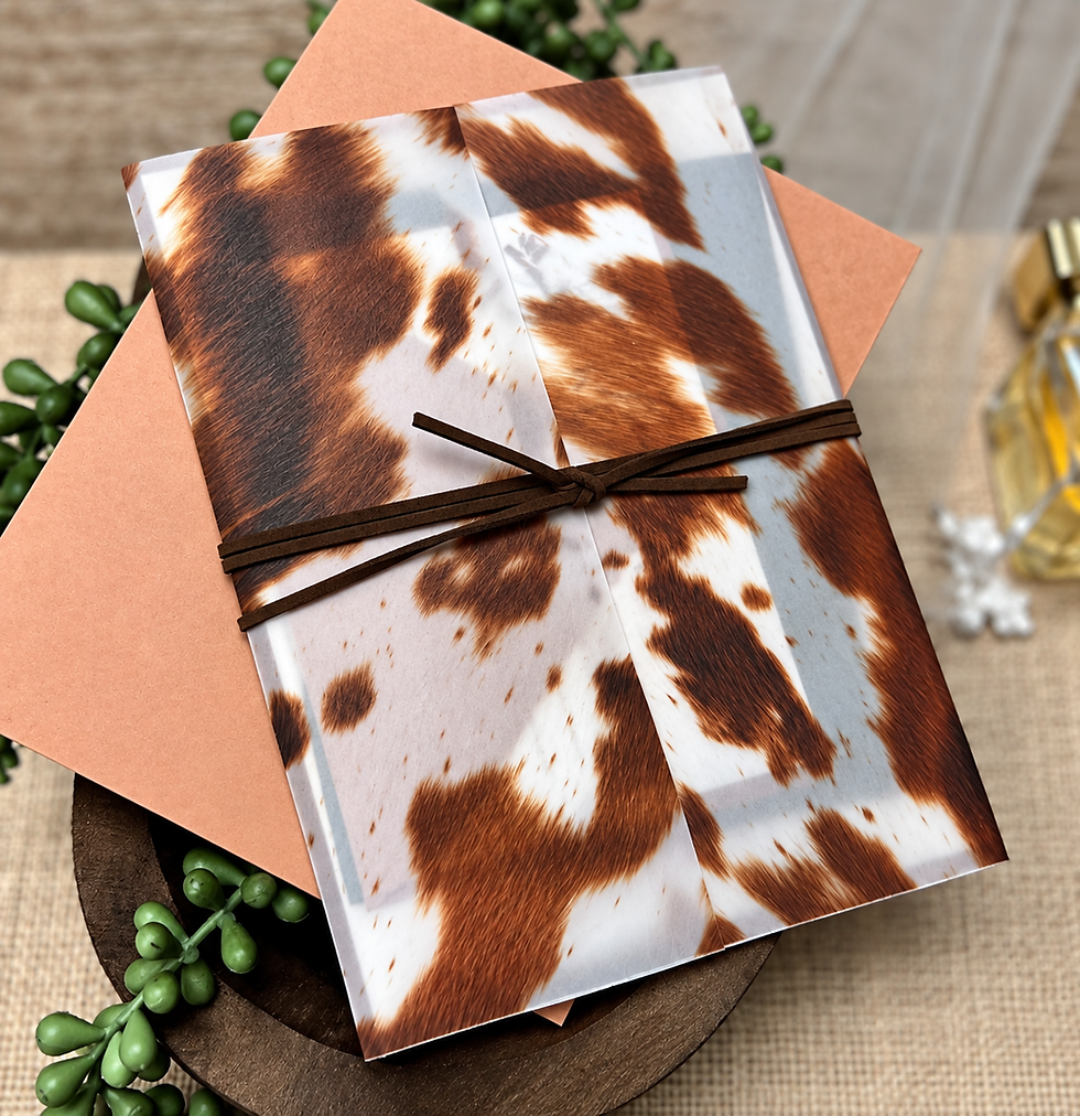 Cowhide print vellum wedding invitation jacket tied with brown suede cord