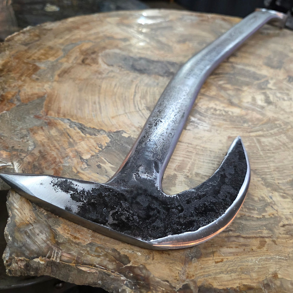 Thumbnail: custom blacksmith forged axe from large industrial wrench
