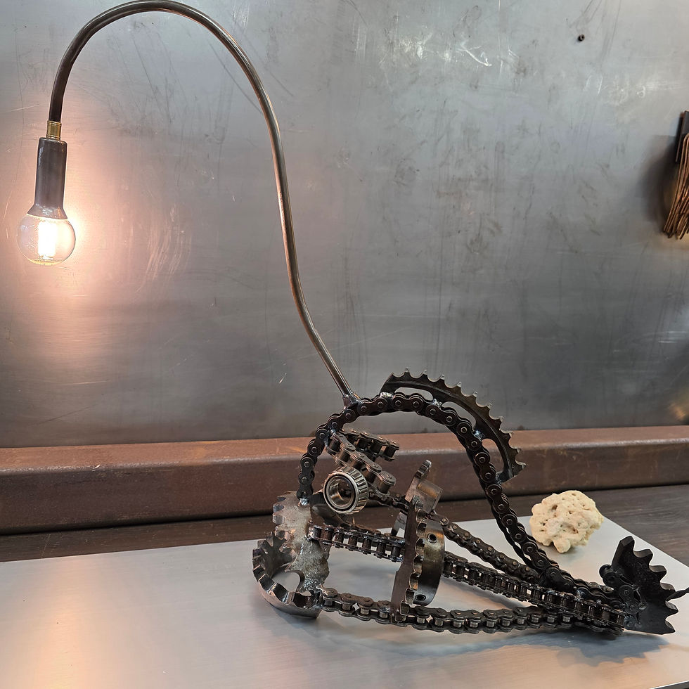 Thumbnail: handmade metal angler fish lamp with curved steel lure arm and exposed bulb
