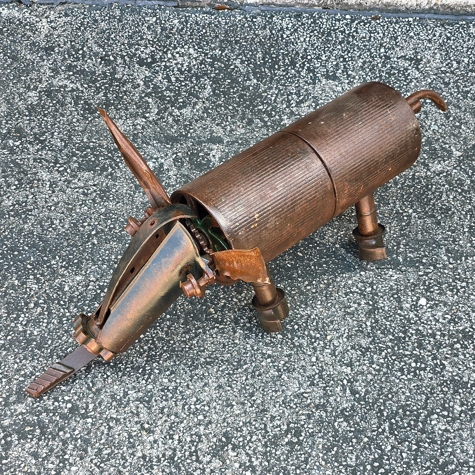 Handmade industrial metal aardvark sculpture from reclaimed steel
