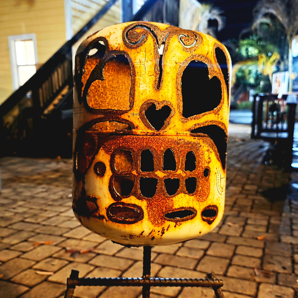 Thumbnail: Handmade welded sugar skull metal sculpture standing on a rebar skeletal body with oversized steel feet, featuring a plasma-c