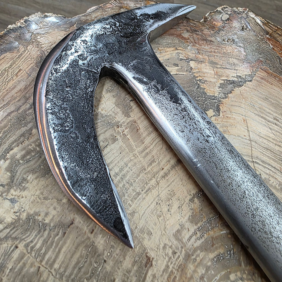 Thumbnail: custom blacksmith forged axe from large industrial wrench