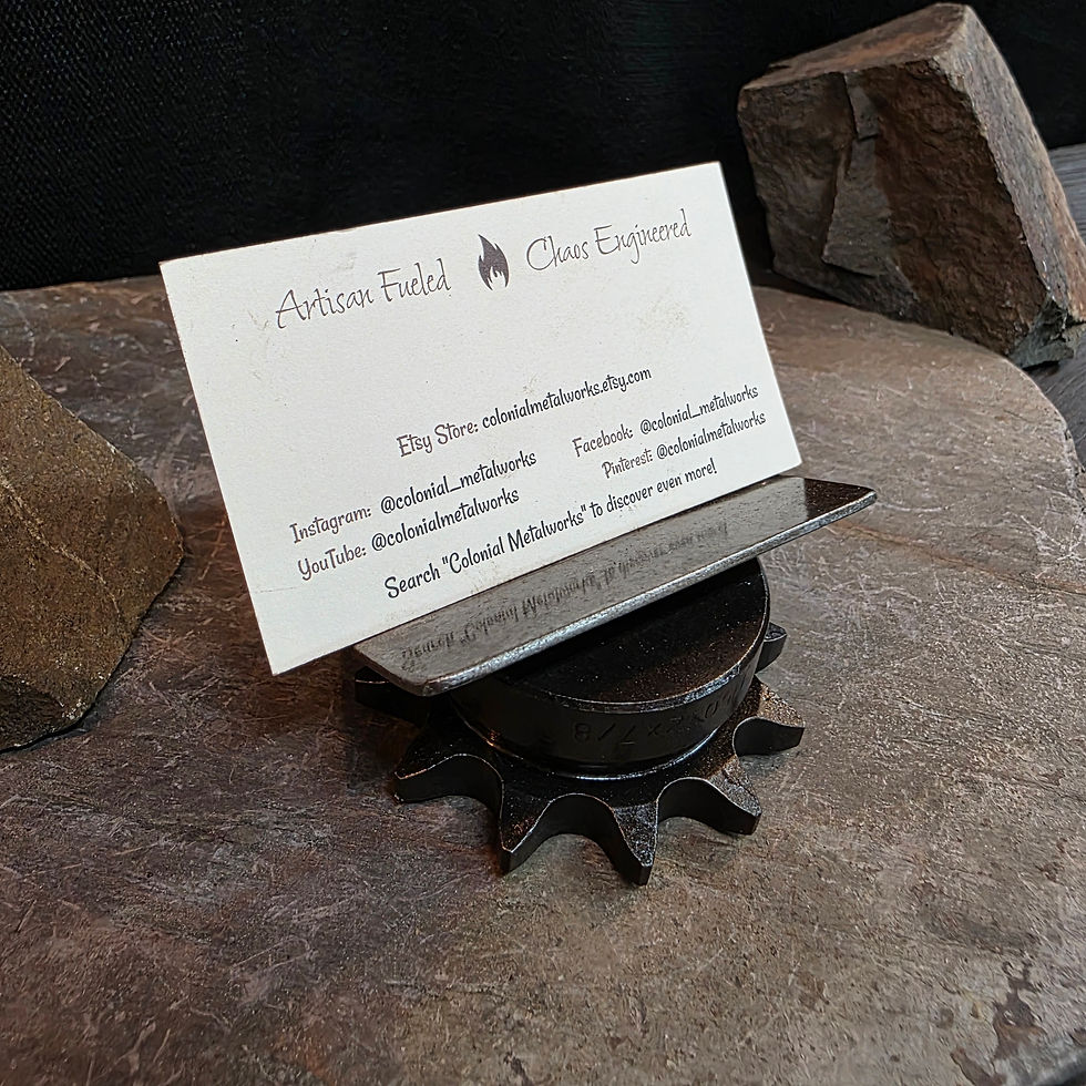 Thumbnail: Handmade steel desk card stand with gear base and angled holder