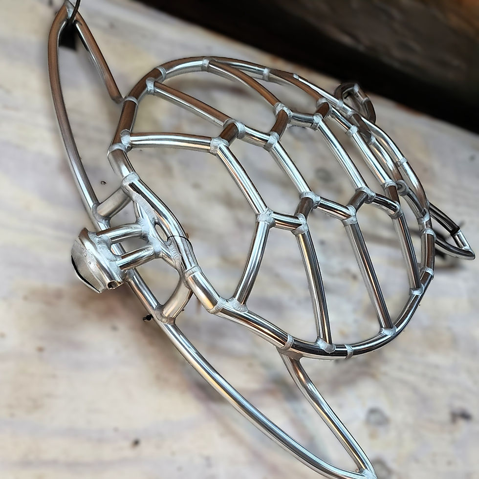 Thumbnail: Modern industrial sea turtle wall art made from bent aluminum tubing with geometric shell pattern