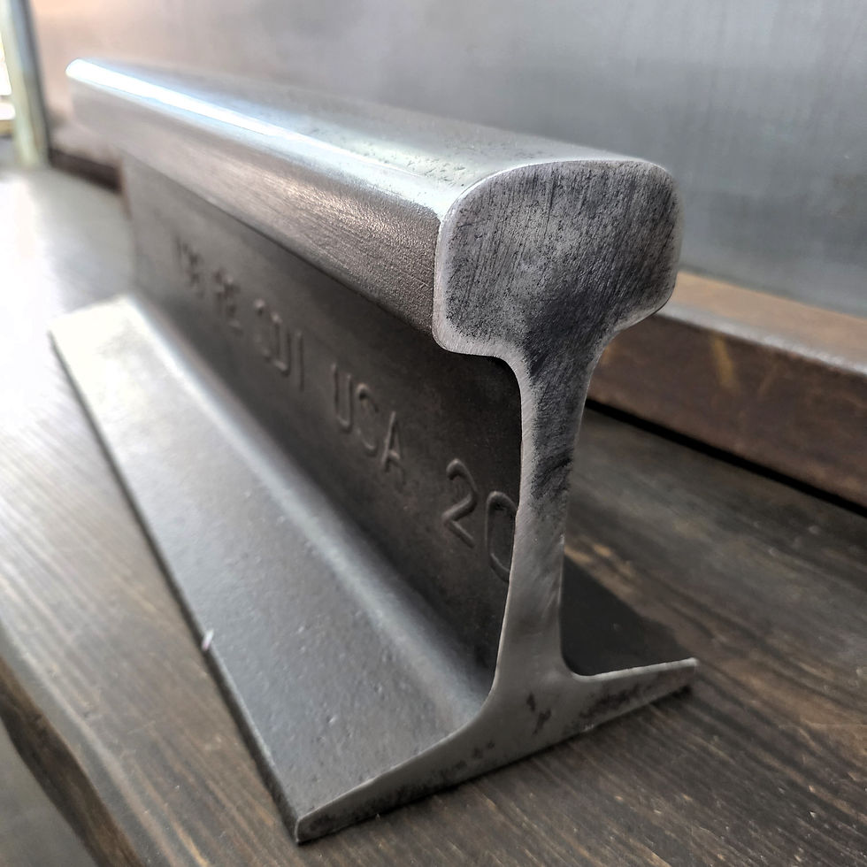 Thumbnail: close up of railroad track anvil end profile and surface texture