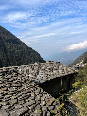 stone roof of a mountain cabin in the alps of Italy