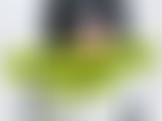 Dog holding raw meat, illustrating natural raw feeding and whether raw food is safe for dogs in the UK