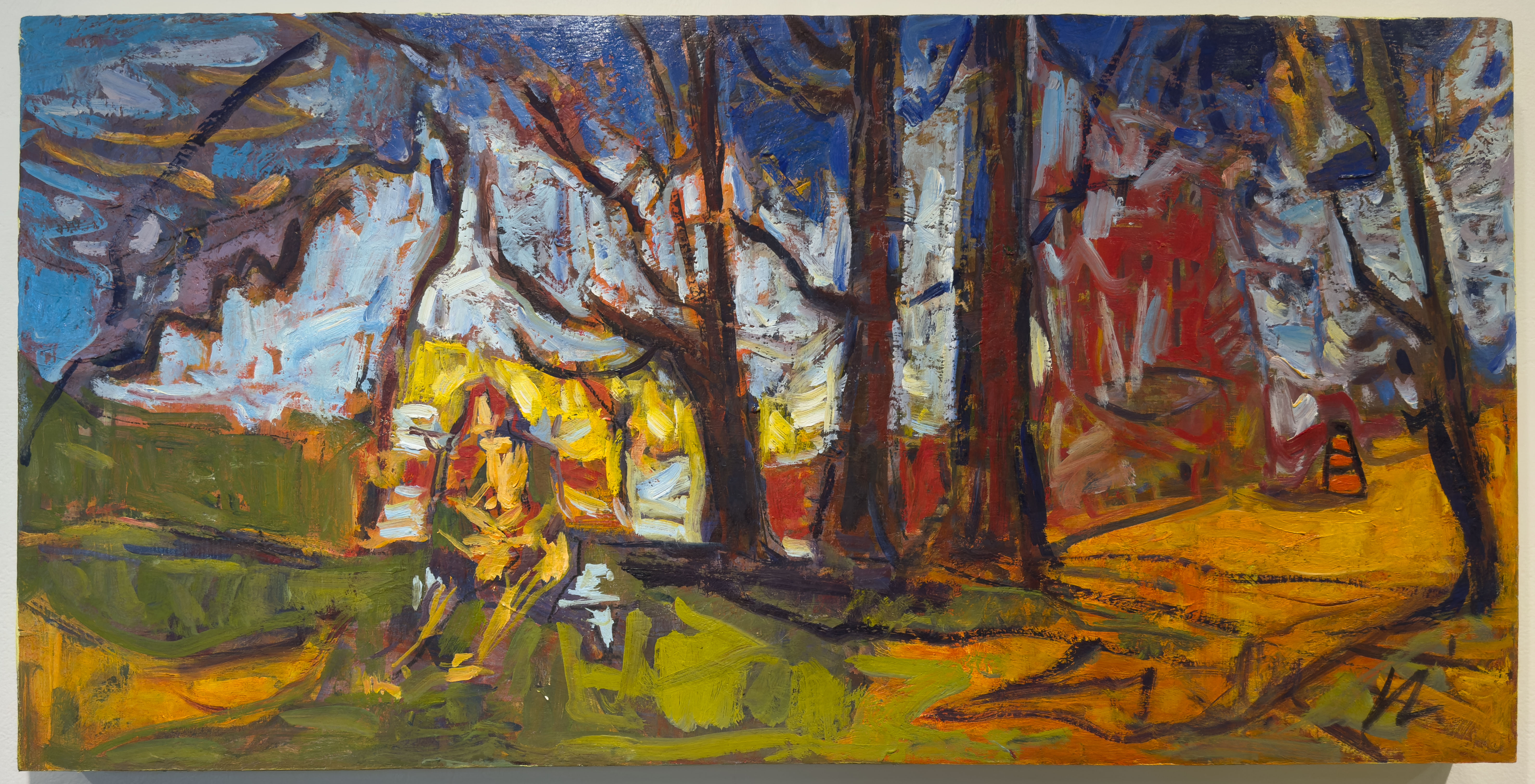 A bold White House with trees in front with a figure sitting by them.