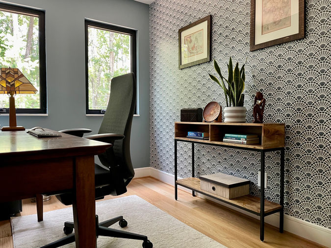 Home office with slate blue paint and wallpaper