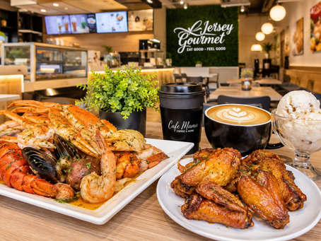 A diverse spread of fresh local comfort food, artisan coffee, and premium desserts at Jersey Gourmet in East Orange, NJ.