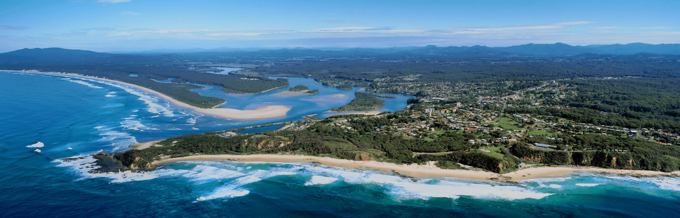 Aerial view of Nambucca Valley, NSW, showcasing the coastline, winding river, lush greenery, and residential areas on the Mid North Coast