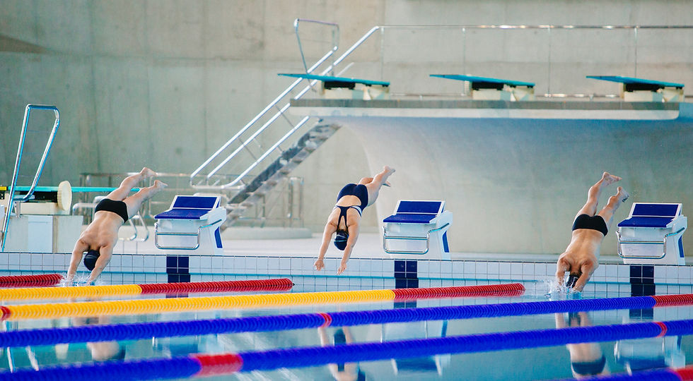 Swimmers Diving In