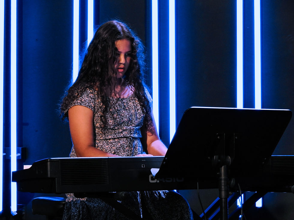 Girl playing at piano