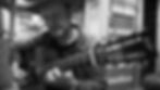 Thomm Jutz and his Ole Rufus guitar, made by Rufus J. Thames. (Photo courtesy of Otis Gibbs)