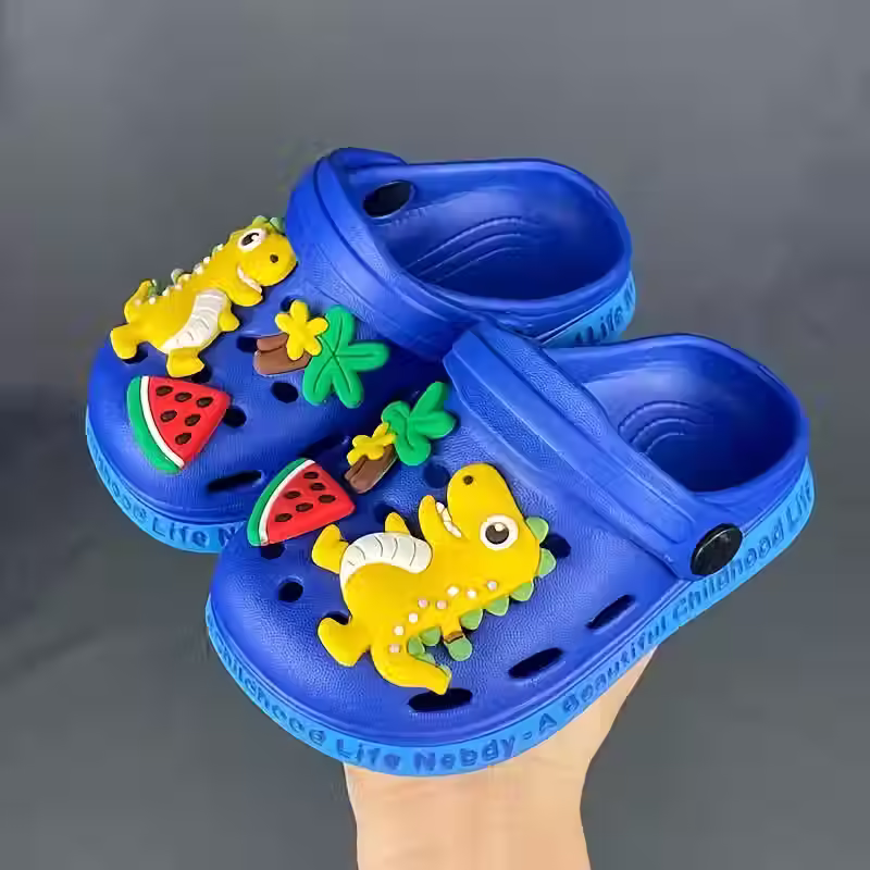 Blue dinosaur clogs